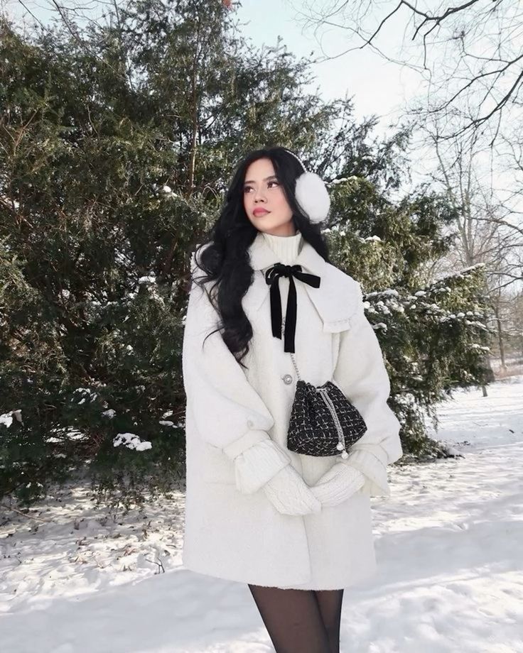 woman wearing white coat